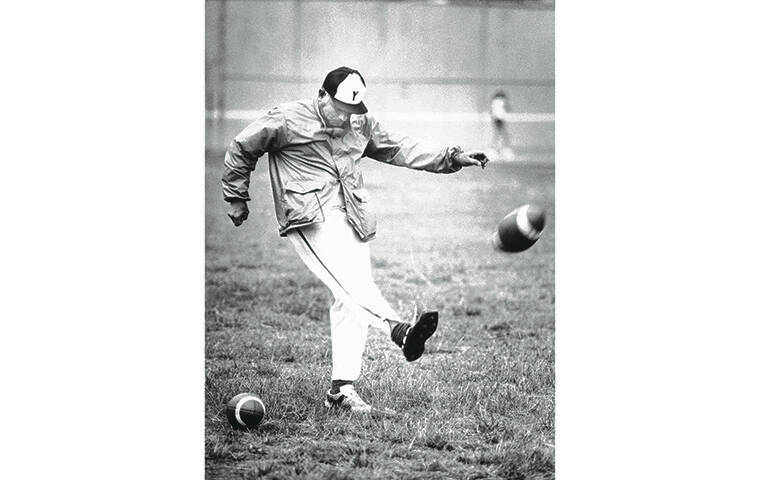 STAR-ADVERTISER / 1980
                                Bill “The Knee” Pacheco was perhaps the only 64-year-old to play in a University of Hawaii vs. alumni football game.