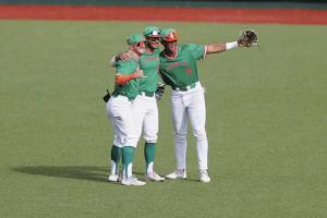 ANDREW LEE / SPECIAL TO THE HONOLULU STAR-ADVERTISER
                                Saturday’s series finale against Cal Poly will be senior day for five UH baseball players. Above, Hawaii’s Scotty Scott, left, Cole Cabrera and Matt Wong celebrated after defeating Cal State Fullerton 17-3 at Les Murakami Stadium.