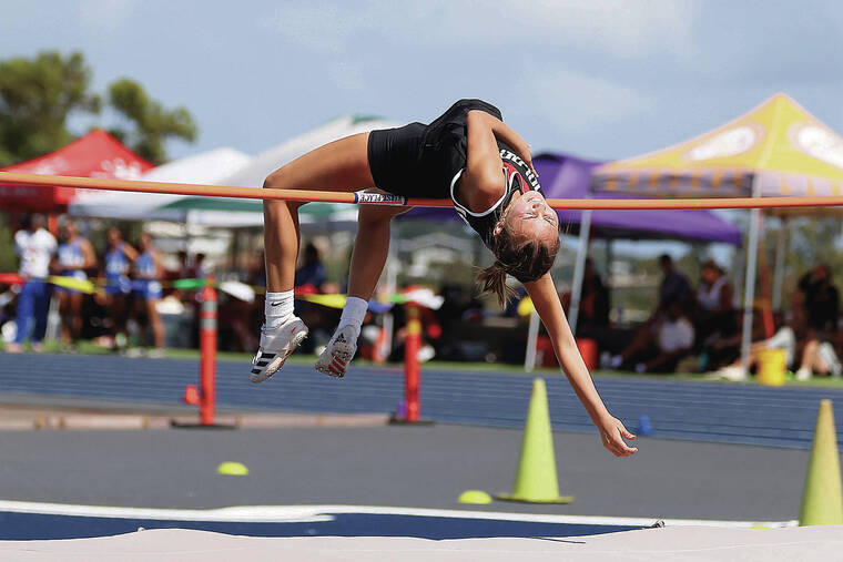 ANDREW LEE / SPECIAL TO THE HONOLULU STAR-ADVERTISER
                                ‘Iolani’s Alexis King cleared the high jump bar during Friday’s Island Movers HHSAA Track & Field State Championships at Kamehameha Schools. King won with a high jump of 5 feet, 4 inches.