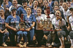 ANDY VLIET / SPECIAL TO THE STAR-ADVERTISER
                                Players from Waimea, left, and Kapaa posed with their trophies after Kapaa won the D-II state title Saturday at Patsy Mink Field on Saturday.