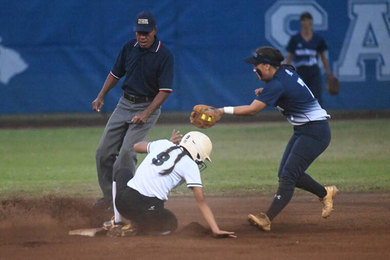 ANDY VLIET / SPECIAL TO THE STAR-ADVERTISER
                                Kapaa’s Kaia Davis-Caberto is tagged out at second base by Waimea’s Sianni Sakai.
