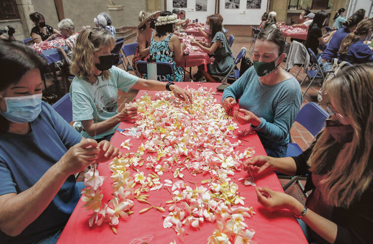JAMM AQUINO / JAQUINO@STARADVERTISER.COM
                                Volunteers wove plumeria lei at Honolulu Hale on Friday to be used during Memorial Day services at the National Cemetery of the Pacific at Punchbowl. Shown are Judy Park, left, Betsy Weatherford, Gay Kong and Ani Lagpacan.