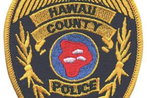 STAR-ADVERTISER FILE
                                Hawaii County Police badge.