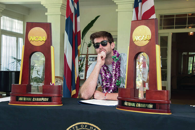 CRAIG T. KOJIMA / CKOJIMA@STARADVERTISER.COM 
                                Kyler Presho probably wasn’t contemplating a future in the political arena as he struck a pose with two NCAA trophies at Washington Place on Tuesday.