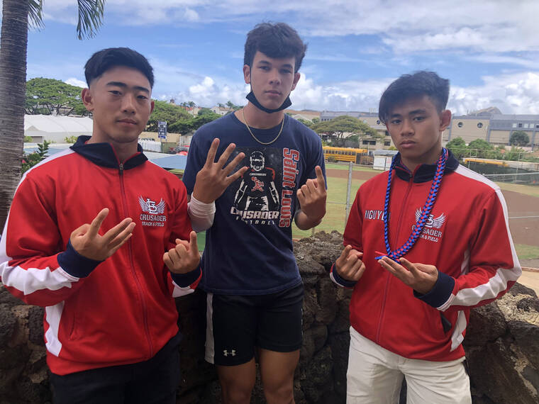 PAUL HONDA / PHONDA@STARADVERTISER.COM
                                Three members of the Crusaders’ winning 4x100-meter relay team posed Monday at Saint Louis. They are, from left, Yosei Takahashi, Kanoa Monteilh and Vu Nguyen. The fourth member of the team that won the title at Saturday’s state meet, Trech Kekahuna, was at another appointment.