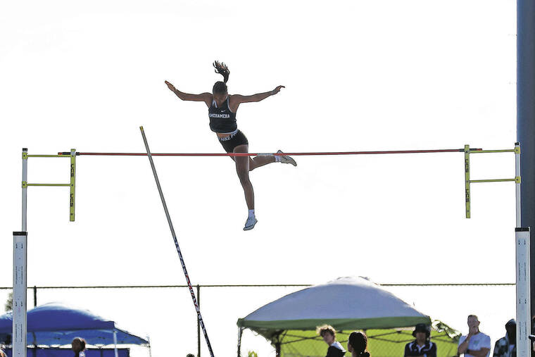 ANDREW LEE / SPECIAL TO THE STAR-ADVERTISER
                                Kamehameha’s won the girls pole vault with a record 13 feet, 1 inch.