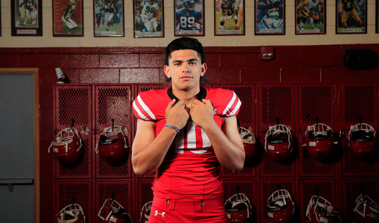 JAMM AQUINO / JANUARY 10
                                Kahuku linebacker Liona Lefau posed for a portrait as the Star-Advertiser All-State defensive player of the year as a junior. Lefau, the top-ranked prospect from Hawaii in the class of 2023, committed to Texas on Saturday.
