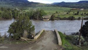 RICK BOWMER / AP
                                A washed out bridge shown along the Yellowstone River, Wednesday, near Gardiner, Mont.