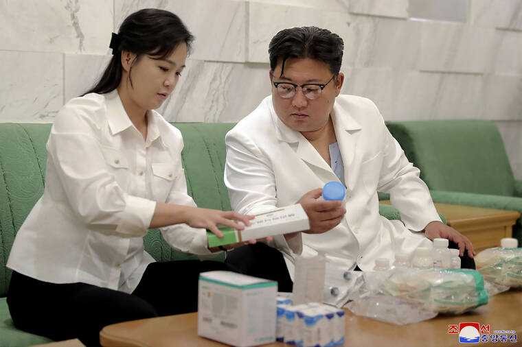 KOREAN CENTRAL NEWS AGENCY/KOREA NEWS SERVICE VIA AP
                                In this photo provided by the North Korean government, North Korean leader Kim Jong Un and his wife Ri Sol Ju prepare medicines at an unannounced place in North Korea.