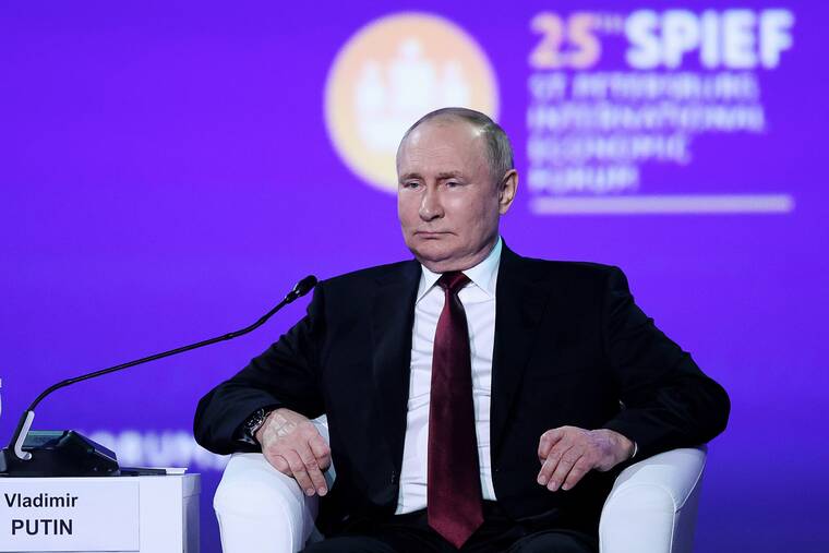 POOL PHOTO VIA AP / JUNE 17
                                Russia is on the verge of default of its foreign debt in the aftermath of the war on Ukraine launched by President Vladimir Putin, shown here during the recent St. Petersburg International Economic Forum in St.Petersburg, Russia.
