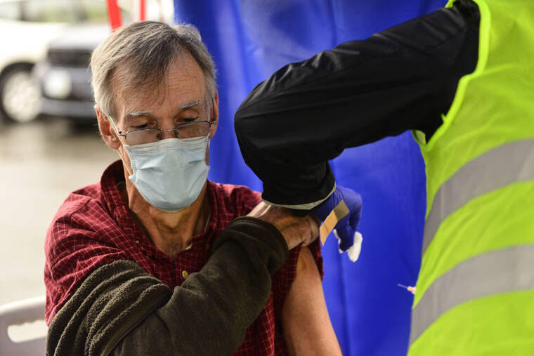 KRISTOPHER RADDER/THE BRATTLEBORO REFORMER VIA ASSOCIATED PRESS
                                Crager Boardman, from Brattleboro, Vt., receives a shot at a flu vaccine clinic in Brattleboro, Oct. 26. A federal advisory panel today says Americans 65 and older should get newer, souped-up flu vaccines.