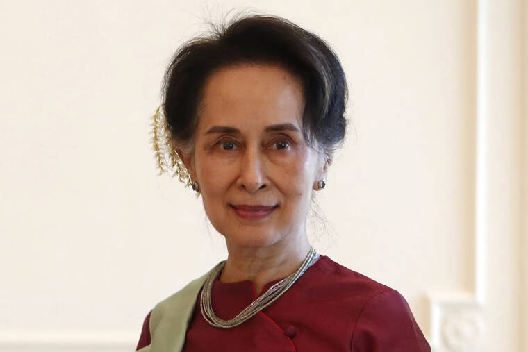 ASSOCIATED PRESS / 2020
                                Myanmar’s leader Aung San Suu Kyi receives a final report from Philippine diplomat Rosario Manalo, a member of the Independent Commission of Enquiry for Rakhine State, at the Presidential Palace in Naypyitaw, Myanmar.