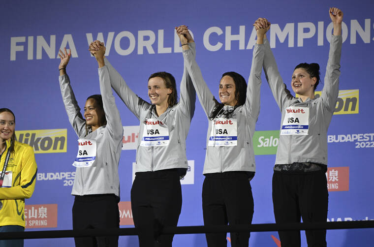 ASSOCIATED PRESS
                                Gold medalists from the United States celebrate their victory after the women 4x200 freestyle relay final at the 19th FINA World Championships in Budapest, Hungary, today.