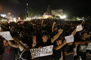 ASSOCIATED PRESS
                                Demonstrators hold slogans as they gather at the People’s Power Monument in Quezon city, north of Manila Philippines, in November 2016, to protest against the burial of the late dictator Ferdinand Marcos. Filipino voters overwhelmingly elected Ferdinand “Bongbong” Marcos Jr., as president during the May 2022 elections, completing a stunning return to power for the family of the late President Ferdinand Marcos, Sr., who ruled the country for more than two decades until being ousted in 1986 in the nonviolent “People Power” revolution.