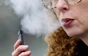 ASSOCIATED PRESS
                                A woman exhales while vaping from a Juul pen e-cigarette in Vancouver, Wash., in April 2019. Juul has asked a federal court, today, to block a government order to stop selling its electronic cigarettes. Federal health officials on Thursday ordered Juul to pull its electronic cigarettes from the U.S. market, the latest blow to the embattled company widely blamed for sparking a national surge in teen vaping.