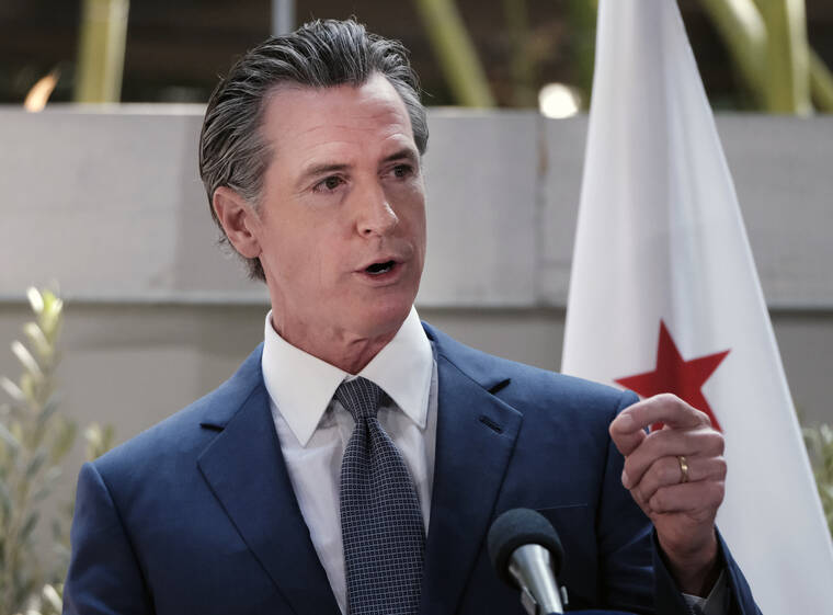 ASSOCIATED PRESS
                                California Governor Gavin Newsom answers questions at a news conference in Los Angeles, on June 9. California Gov. Newsom, Washington Gov. Jay Inslee and Oregon Gov. Kate Brown, today, vowed to protect reproductive rights and help women who travel to the West Coast seeking abortions following the Supreme Court’s decision to overturn Roe v. Wade.