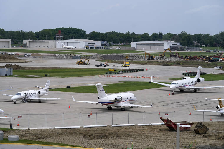 ASSOCIATED PRESS / JUNE 13
                                Planes sit on the tarmac at the Des Moines International Airport in Des Moines, Iowa.