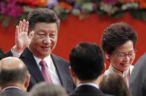 ASSOCIATED PRESS
                                Chinese President Xi Jinping, left, and Hong Kong’s new Chief Executive Carrie Lam attend the ceremony of administering the oath for a five-year term in office at the Hong Kong Convention and Exhibition Center in Hong Kong on July 1, 2017.