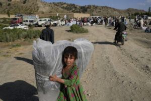 ASSOCIATED PRESS / JUNE 24
                                An Afghan girl carries a donated matress after an earthquake in Gayan village, in Paktika province, Afghanistan, Friday.