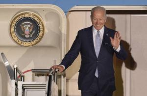 MARKUS SCHREIBER / AP
                                President Joe Biden waves as he leaves Air Force One after arriving at Franz-Josef-Strauss Airport near Munich, Germany Saturday, ahead of the G7 summit.