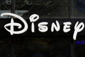 ASSOCIATED PRESS / 2017
                                A sign at the Disney store on the Champs Elysees Avenue in Paris, France.