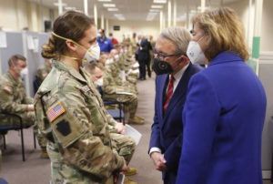 ASSOCIATED PRESS / JAN. 6
                                Ohio Gov. Mike DeWine, center, and his wife Fran, right, talk with specialist Emily Milosevic as they tour the Defense Supply Center Columbus in Columbus, Ohio, as members of the Ohio Army National Guard prepare to deploy to aid Ohio hospitals during the current surge in COVID-19 hospitalizations.