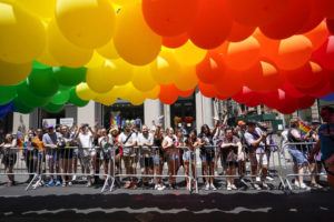 ASSOCIATED PRESS
                                Spectators watch as revelers march down Fifth Avenue during the annual NYC Pride March today in New York.
