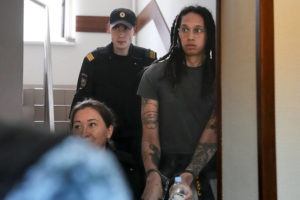 ASSOCIATED PRESS
                                WNBA star and two-time Olympic gold medalist Brittney Griner is escorted to a courtroom for a hearing, in Khimki just outside Moscow, Russia, today. Shackled and looking wary, WNBA star Brittney Griner was ordered to stand trial Friday by a court near Moscow on cannabis possession charges, about 4 1/2 months after her arrest at an airport while returning to play for a Russian team.