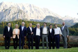 ASSOCIATED PRESS
                                Members of the G7 from left, Prime Minister of Italy Mario Draghi, European Commission President Ursula von der Leyen, President Joe Biden, German Chancellor Olaf Scholz, British Prime Minister Boris Johnson, Canadian Prime Minister Justin Trudeau, Prime Minister of Japan Fumio Kishida, French President Emmanuel Macron and European Council President Charles Michel stand for a photo at Schloss Elmau following their dinner at G7 Summit in Elmau, Germany, Sunday, June 26. The bench behind them became famous when former German Chancellor Angela Merkel and former President Barack Obama were photographed talking by it.