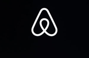 ASSOCIATED PRESS
                                An Airbnb logo is seen, in Febuary 2018, during an event in San Francisco. Airbnb is making permanent its ban on parties at homes listed on the site for short-term rentals.