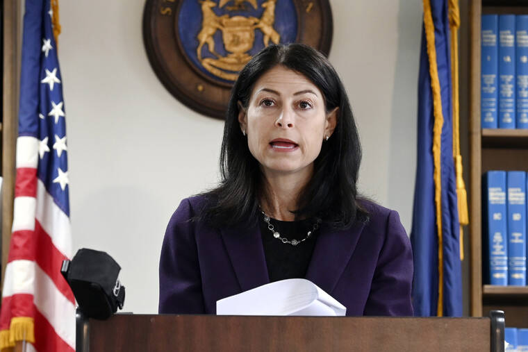 MAX ORTIZ/DETROIT NEWS VIA ASSOCIATED PRESS
                                Michigan Attorney General Dana Nessel speaks during a news conference in Detroit on Oct. 14. A judge had no authority to issue indictments in the Flint water scandal, the Michigan Supreme Court said today in an extraordinary decision that wipes out charges against former Gov. Rick Snyder, his health director and seven other people. It’s an astonishing defeat for Attorney General Dana Nessel, who took office in 2019.