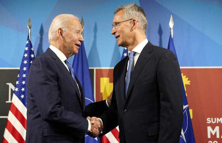 ASSOCIATED PRESS
                                President Joe Biden, left, is greeted by NATO Secretary General Jens Stoltenberg during their arrival for a NATO summit in Madrid, Spain, today. North Atlantic Treaty Organization heads of state and government will meet for a NATO summit in Madrid from Tuesday through Thursday.