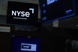 ASSOCIATED PRESS
                                An NYSE sign is seen on the floor at the New York Stock Exchange in New York, June 15. Stocks shifted between gains and losses on Wall Street today, keeping the market on track for its fourth monthly loss this year.