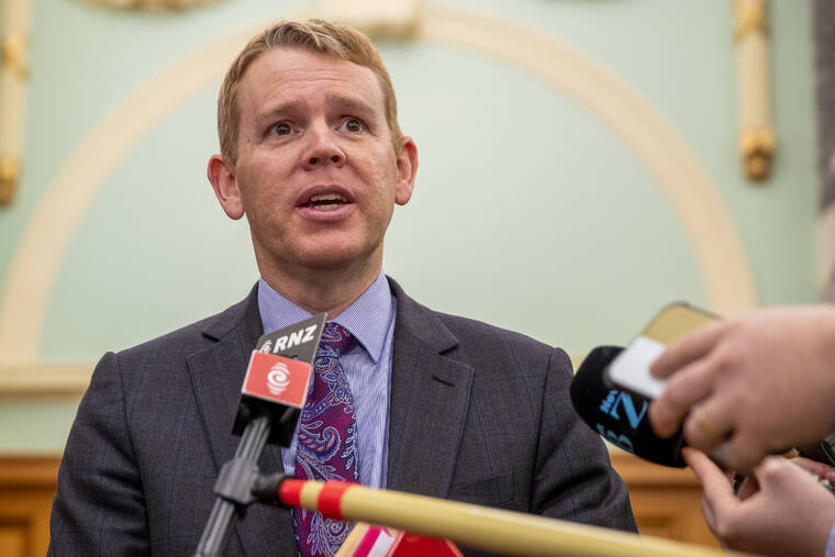 NEW ZEALAND HERALD VIA AP
                                New Zealand Police Minister Chris Hipkins speaks during his press conference at Parliament in Wellington, New Zealand.