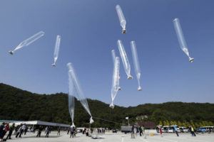 ASSOCIATED PRESS
                                North Korean defectors release balloons carrying leaflets condemning North Korean leader Kim Jong Un and his government’s policies in Paju, South Korea, near the border with North Korea, on Oct. 10, 2014.