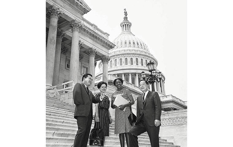 ASSOCIATED PRESS / 1966
                                Sen. Daniel Inouye, left; Rep. Patsy Mink, and Rep. Spark Matsunaga, right, talked with Gaositwe Chiepe, Deputy Director of Education from Bechaunaland, on the steps of the Capitol in Washington.