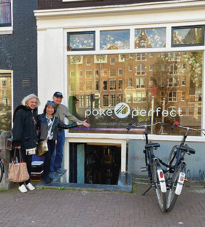 While traveling in April with former Hawaii resident Candace Johnson, left, who now lives in France, Louise Ing and Michael Sitch of Honolulu spotted Poke Perfect in Amsterdam. Photo by Louise Ing.
