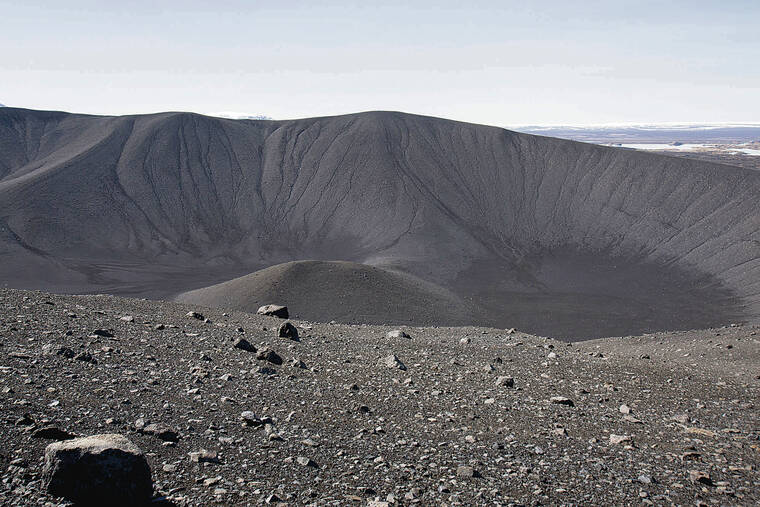 NEW YORK TIMES
                                Hverfjall crater boasts a dark landscape of craters and lava fields.