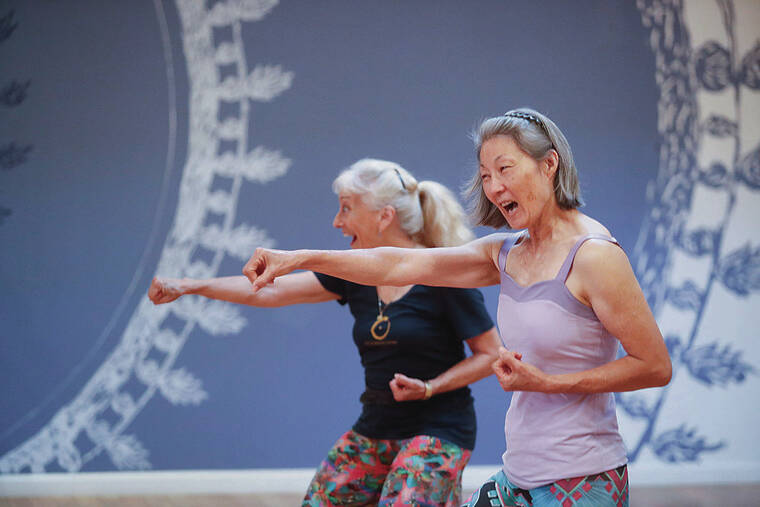CINDY ELLEN RUSSELL / CRUSSELL@STARADVERTISER.COM
                                Sharlene Bliss, right, and Renee Tillotson lead a class in Nia, a combination of martial arts and dance, at the Still & Moving Center in Kakaako.