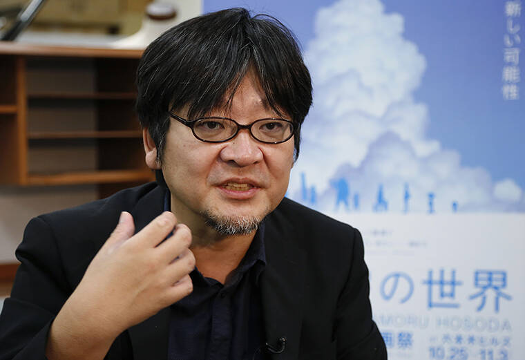 ASSOCIATED PRESS / 2016
                                Japanese animation director Mamoru Hosoda speaks during an interview with The Associated Press at his Chizu Studio in suburban Tokyo.