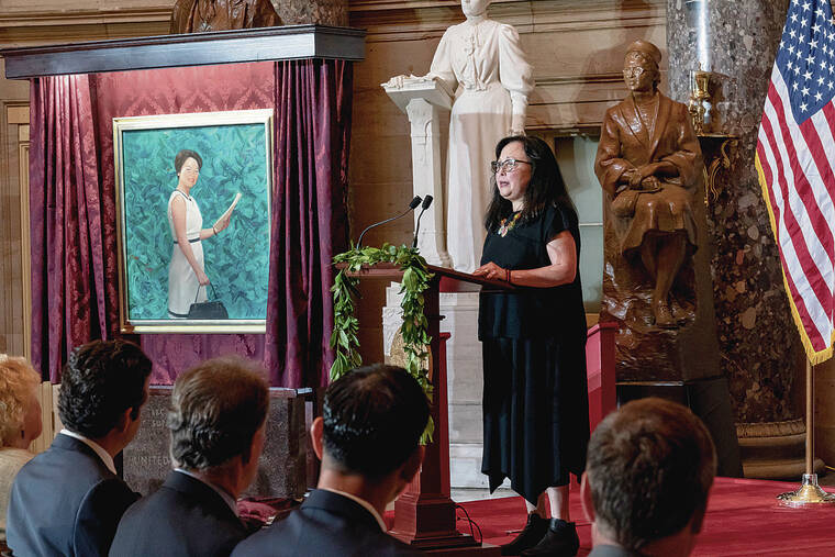 ASSOCIATED PRESS
                                Gwendolyn Mink helped unveil a portrait of her mother, the late Rep. Patsy Mink of Hawaii, during a celebration Thursday at the Capitol in Washington. The ceremony honored the late representative, who was the first Asian American woman elected to Congress and who helped pass the Title IX Amendment to prohibit sex-based discrimination in federal programs.