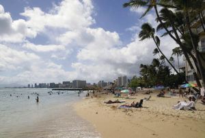 CINDY ELLEN RUSSELL / 2021
                                Kaimana Beach is a popular spot for visitors and residents