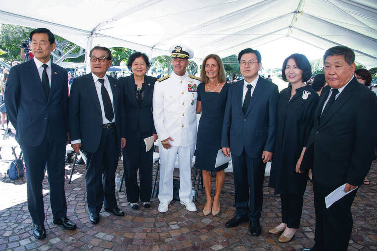 CRAIG T. KOJIMA / CKOJIMA@STARADVERTISER.COM
                                In attendance at Saturday’s commemoration at the National Cemetery of the Pacific at Punchbowl were Gen. Choi Byung-hyuk, left; Kim Jin Young; Annie Chan; Adm. John Aquilino; his wife, Laura Aquilino; former Korean Prime Minister Kyo-ahn Hwang; his wife, Choi Ji-young; and Sung-kil Jung.
