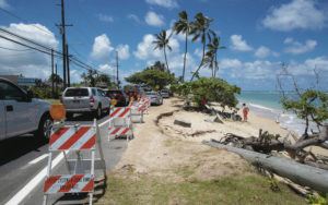 CINDY ELLEN RUSSELL / CRUSSELL@STARADVERTISER.COM
                                Pictured is a line of cars and barricades along the damaged road shoulder of Kamehameha Hwy.