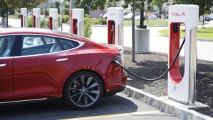 ASSOCIATED PRESS / 2018
                                A Tesla Model S is plugged in at a vehicle Supercharging station in Seabrook, N.H.
