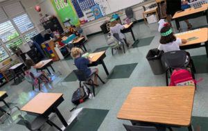 ASSOCIATED PRESS
                                A small group of kindergarteners sits spaced apart in a classroom at Aikahi Elementary School in Kailua, Hawaii.