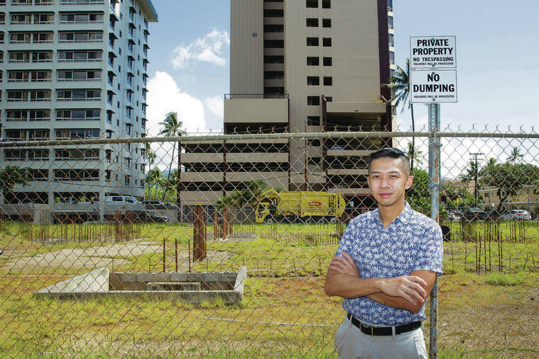 CINDY ELLEN RUSSELL / MARCH 11
                                State Rep. Adrian Tam stands by a property along Tusitala Street in Waikiki he is urging the city to buy.