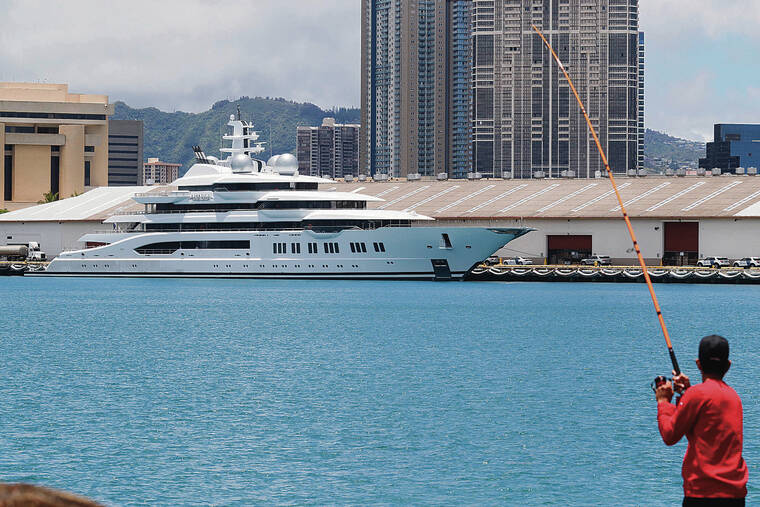 JAMM AQUINO / JAQUINO@STARADVERTISER.COM
                                Above, the full length of the Amadea is seen at dock in Honolulu.