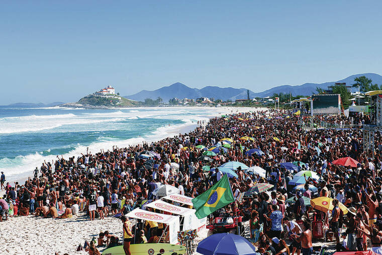 THIAGO DIZ / WORLD SURF LEAGUE
                                Spectators packed the beach for the Oi Rio Pro final at Saquarema, Rio de Janeiro, Brazil, on Tuesday.