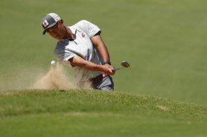 JAMM AQUINO/JAQUINO@STARADVERTISER.COM
                                Peter Jung hits from a greenside bunker onto the 15th green during the final of the 2022 Manoa Cup golf tournament on Saturday, June 25, 2022, at Oahu Country Club in Honolulu.